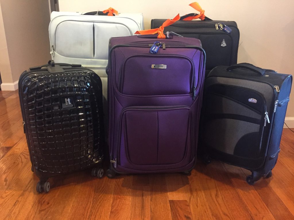 five suitcases for moving to France