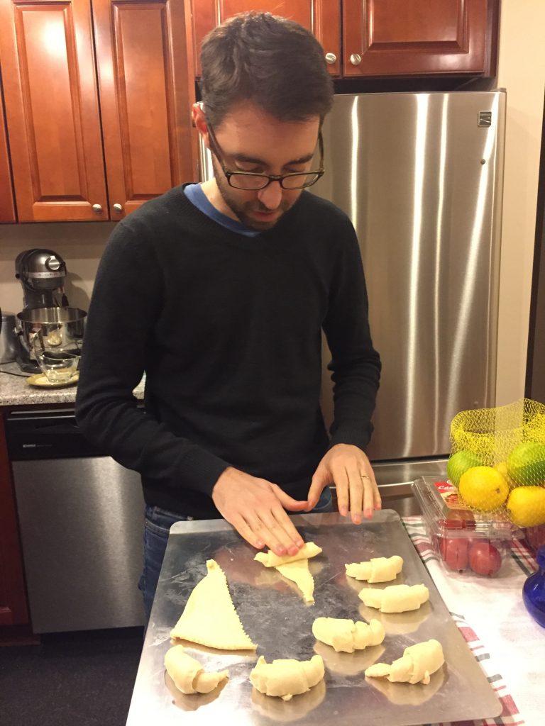 Frenchman rolling Pillsbury croissants