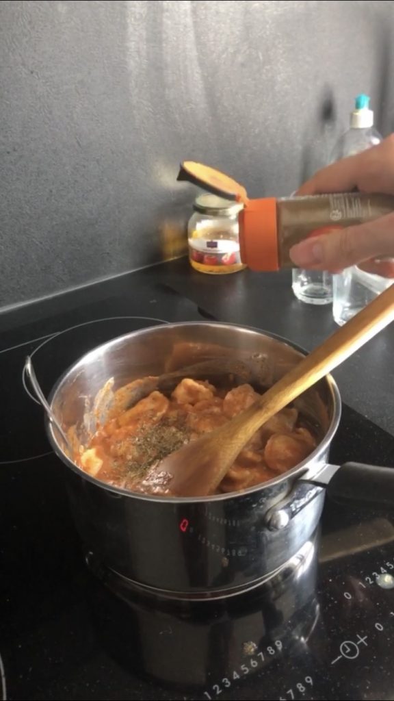 adding spices to canned raviolis