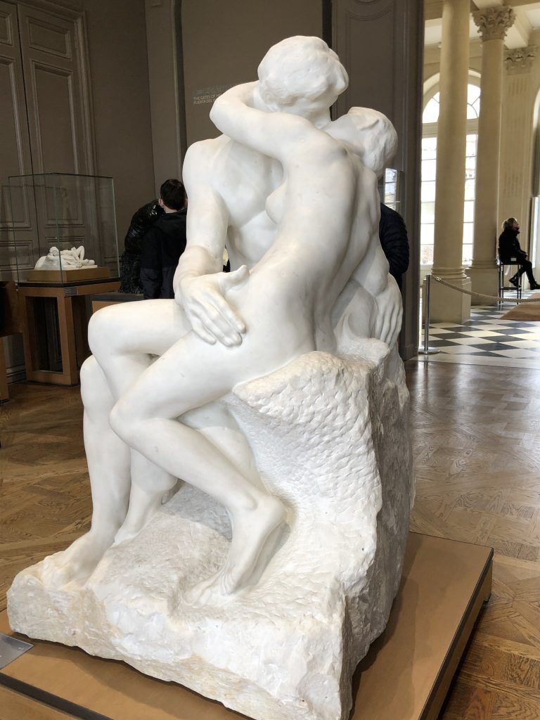 Rodin sculpture of lovers kissing