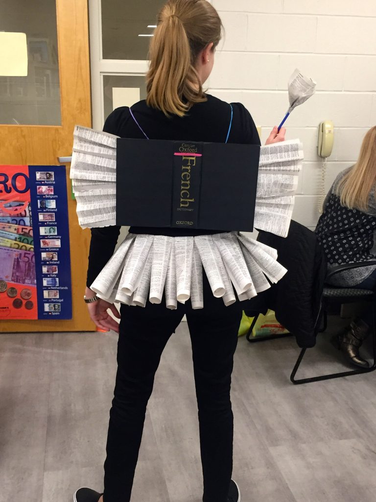 French teacher dressed up for Halloween as diction-fairy