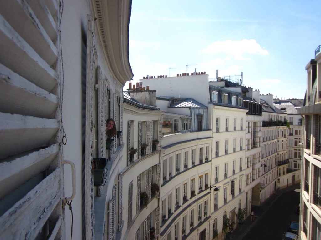 view of apartment buildings on Rue Laferrière in Paris