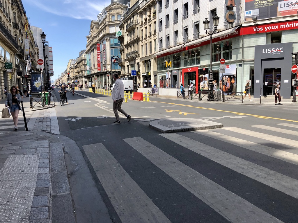 only a few pedestrians on Rue de Rivoli in the middle of the afternoon