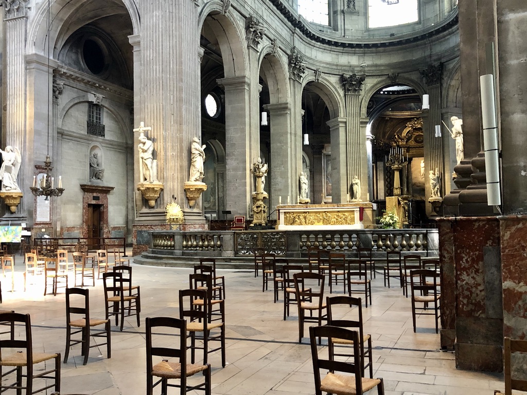 empty and spaced out chairs at Église Saint-Sulpice