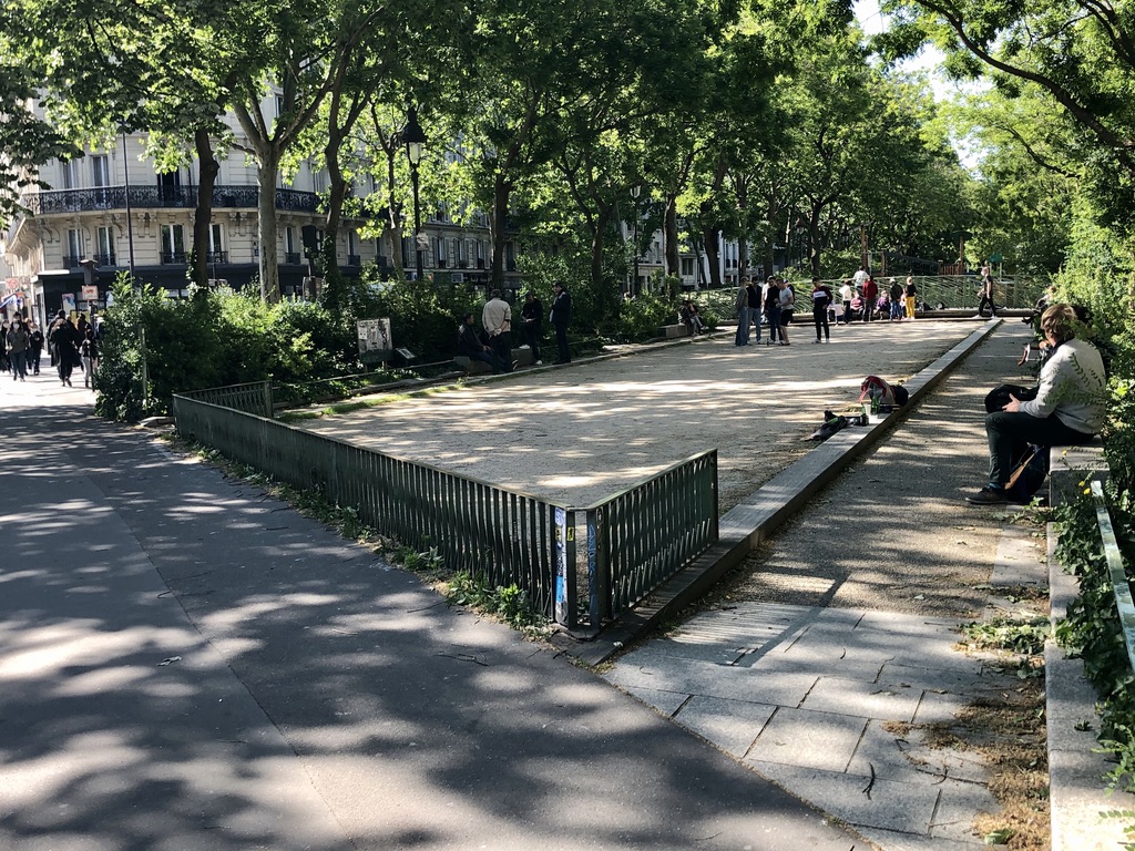 people playing pétanque outdoors