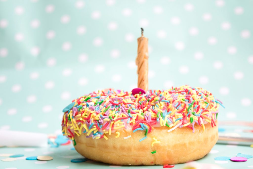 birthday donut with sprinkles one candle