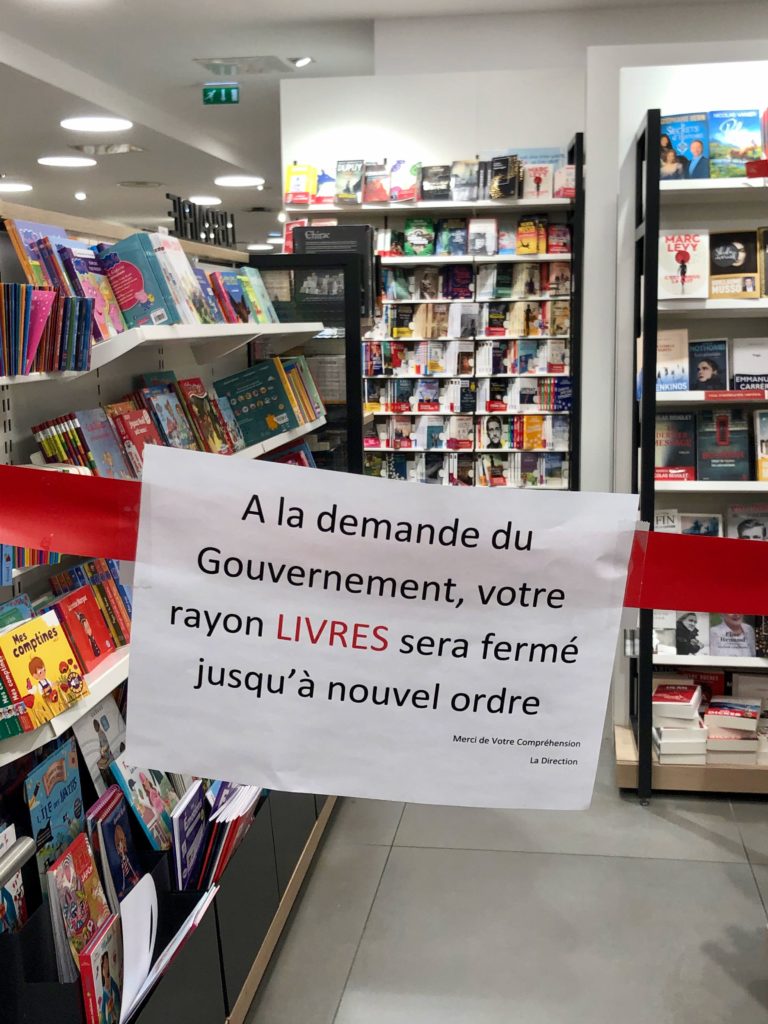sign: book aisle is closed until further notice by order of the government
