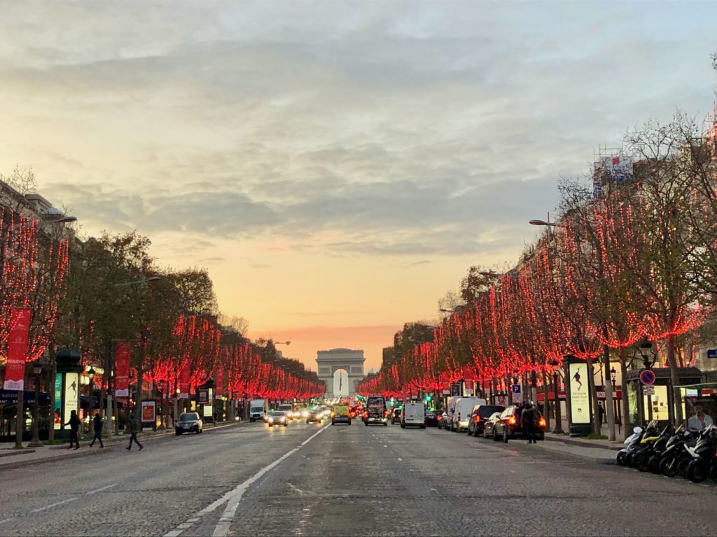 Avenue des Champs Élysées, lined with red lights, Christmas 2020, looking at Arc de Triomphe