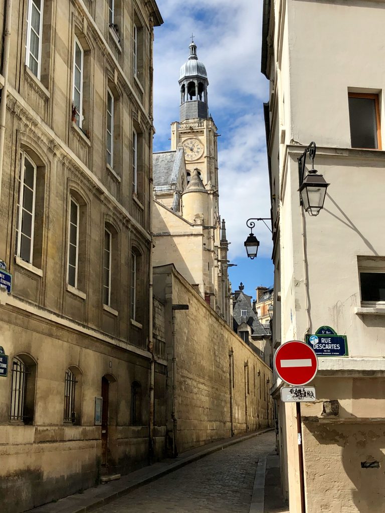 View of Saint-Étienne-du-Mont church bell tower in Paris from Rue Descartes