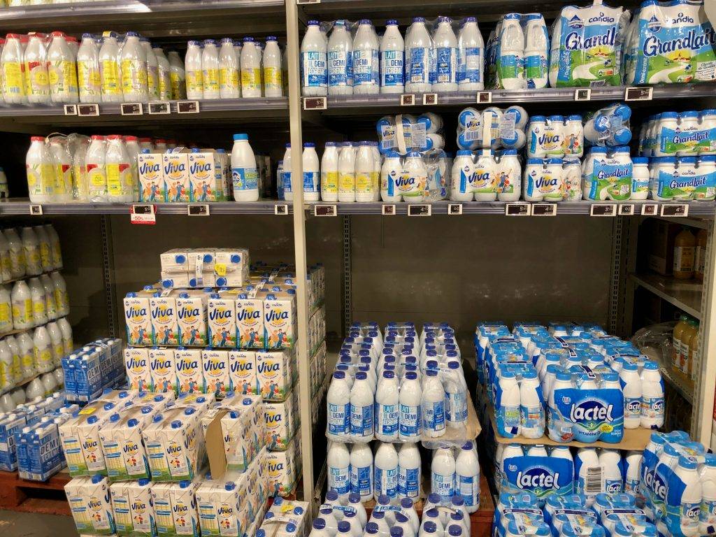 unrefrigerated milk in grocery store in Paris, France