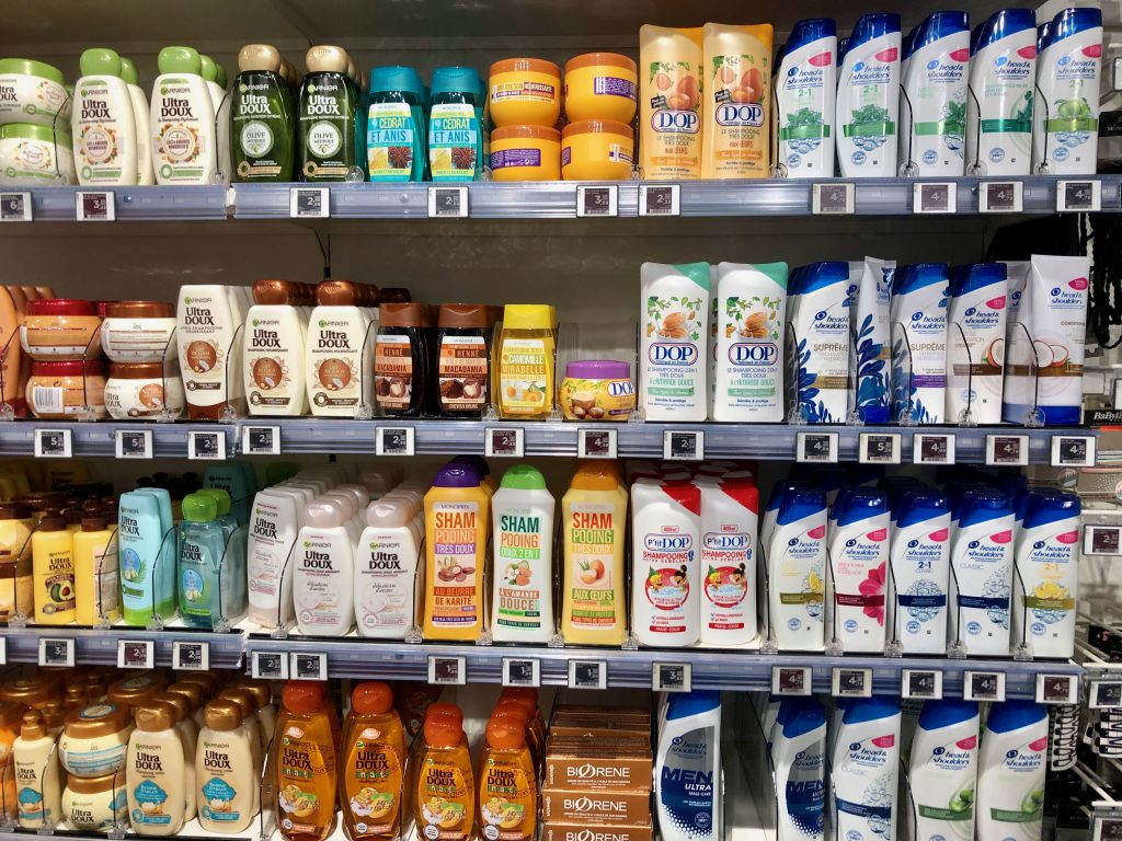 bottles of shampoo in grocery store in Paris, France