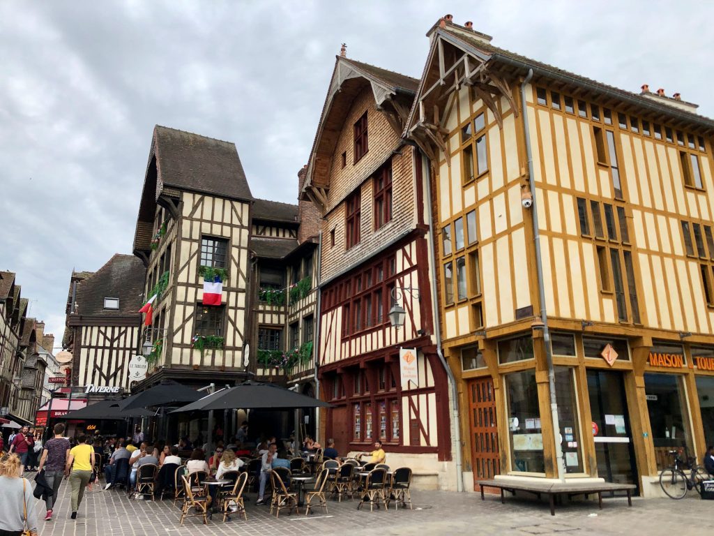 restaurant terrace in Troyes (France) in front of timber-framed buildings
