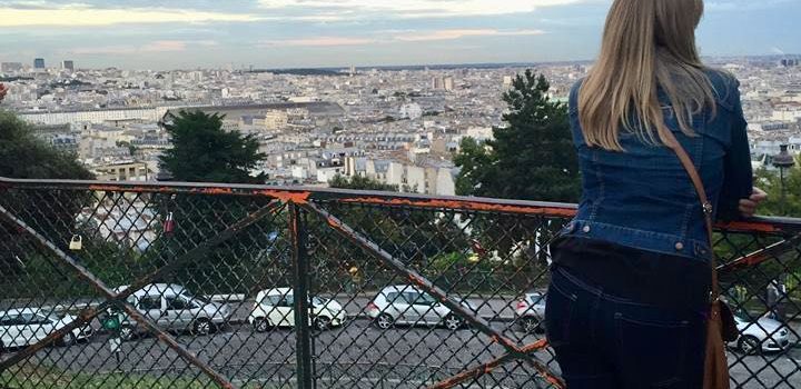 woman looking out over Paris from Montmartre