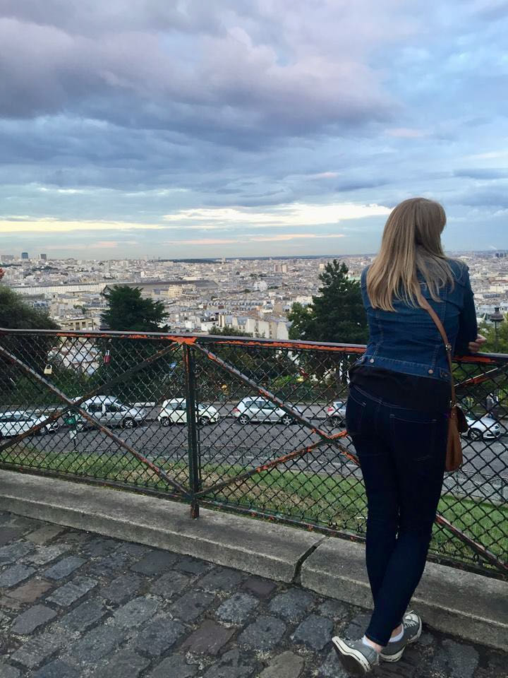 woman looking out over Paris from Montmartre