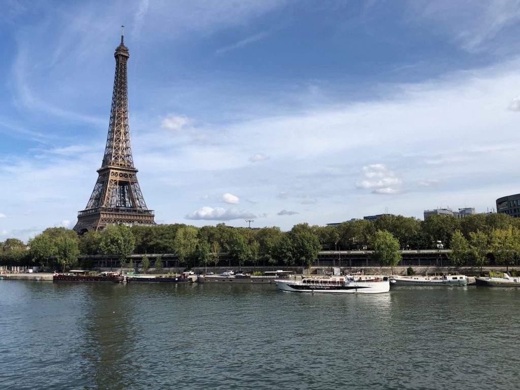 view of Eiffel Tower from Pont de Bir-Hakeim on a cloudy day