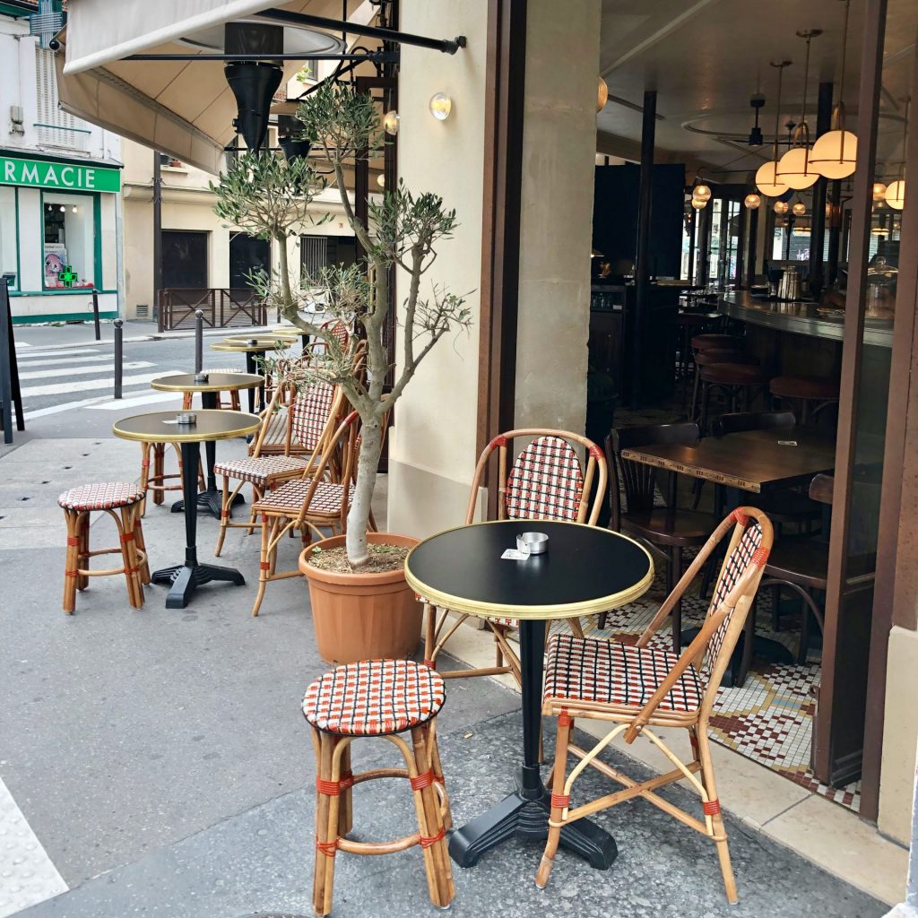 outdoor Paris café seating with bistro tables and chairs