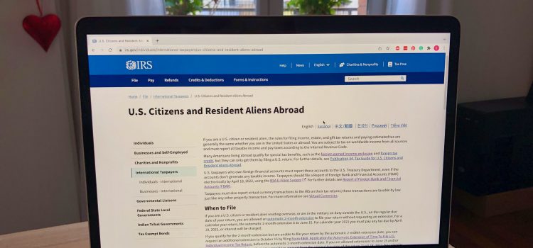 IRS tax website open on a laptop with information for US citizens abroad