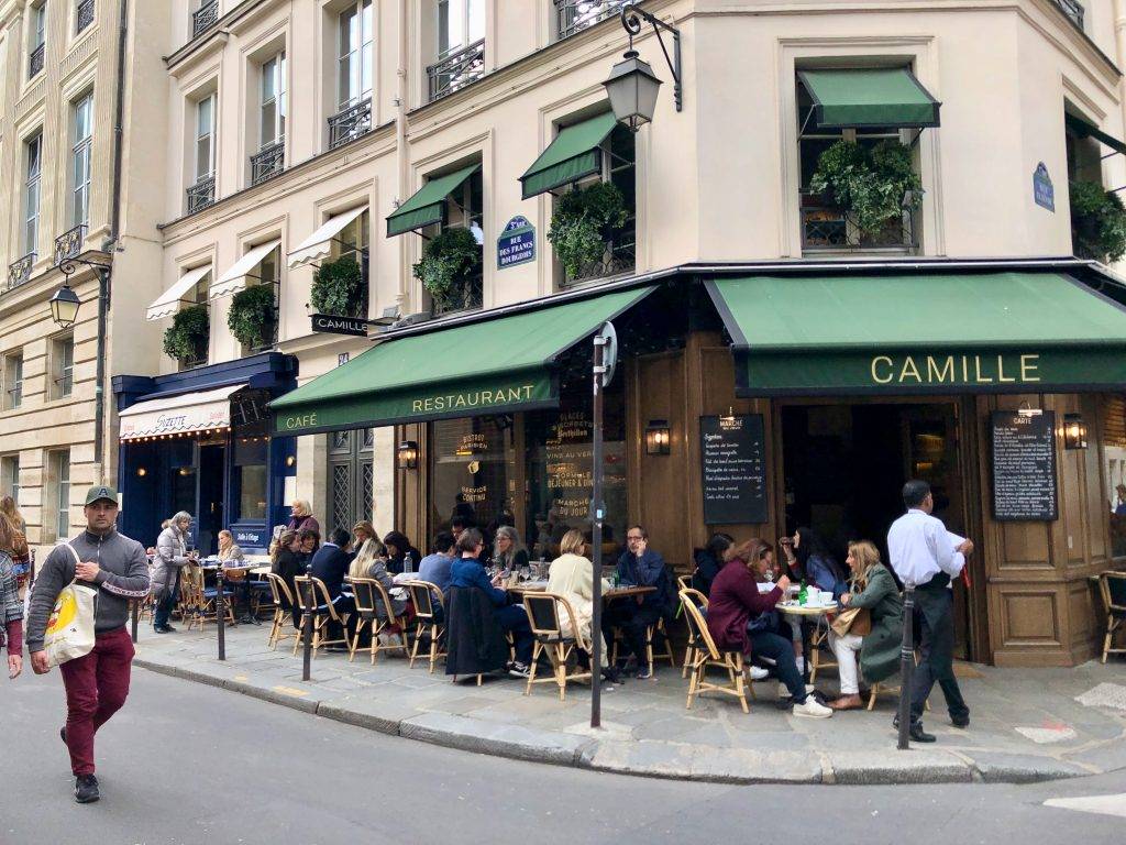 people sitting out on the terrasse of Camille, a restaurant/café in the Paris Marais