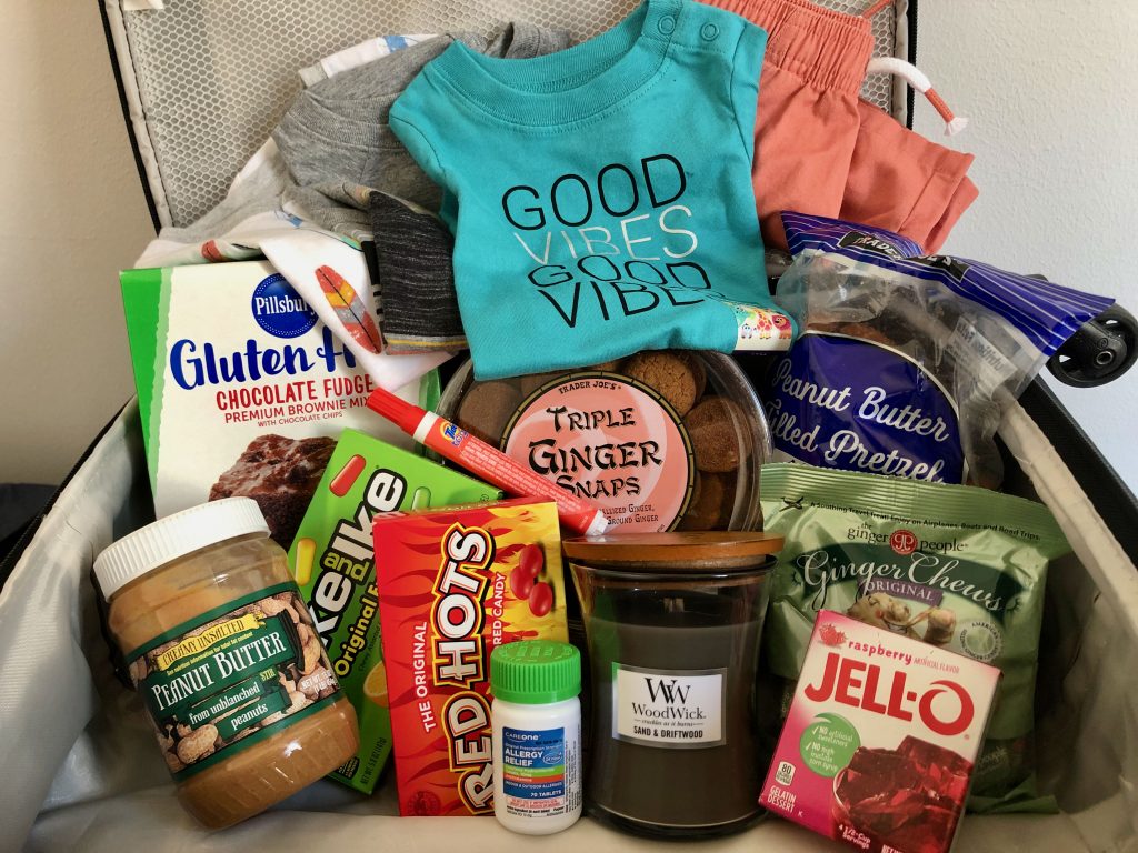 American products and foods piled into a suitcase on the way to France to be given as gifts