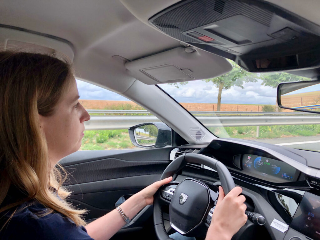 side profile of woman driving in France