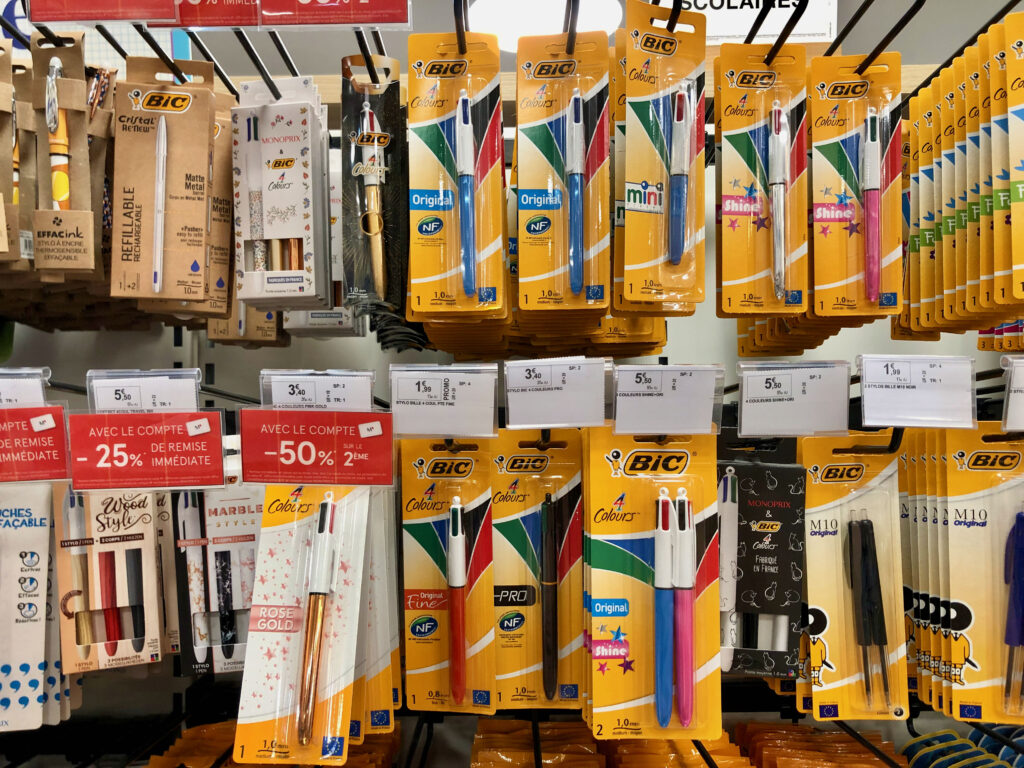 BiC 4 color pens lined up for sale in French office supply store