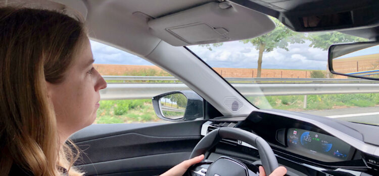 side profile of woman driving in France