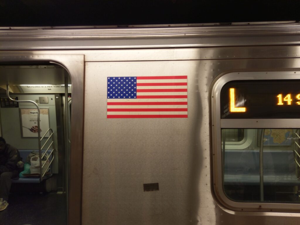 American flag on a Line L New York City subway car