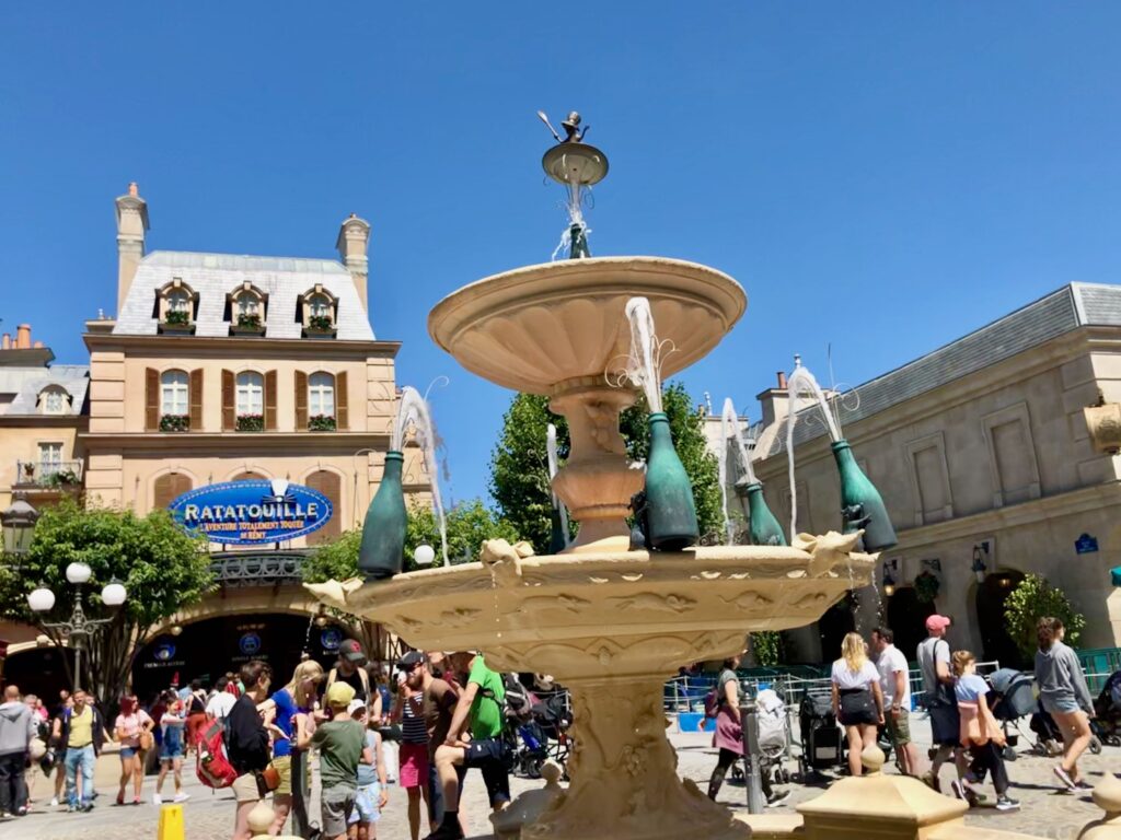 Ratatouille water fountain with Ratatouille ride in the background at the Paris Walt Disney Studios Park