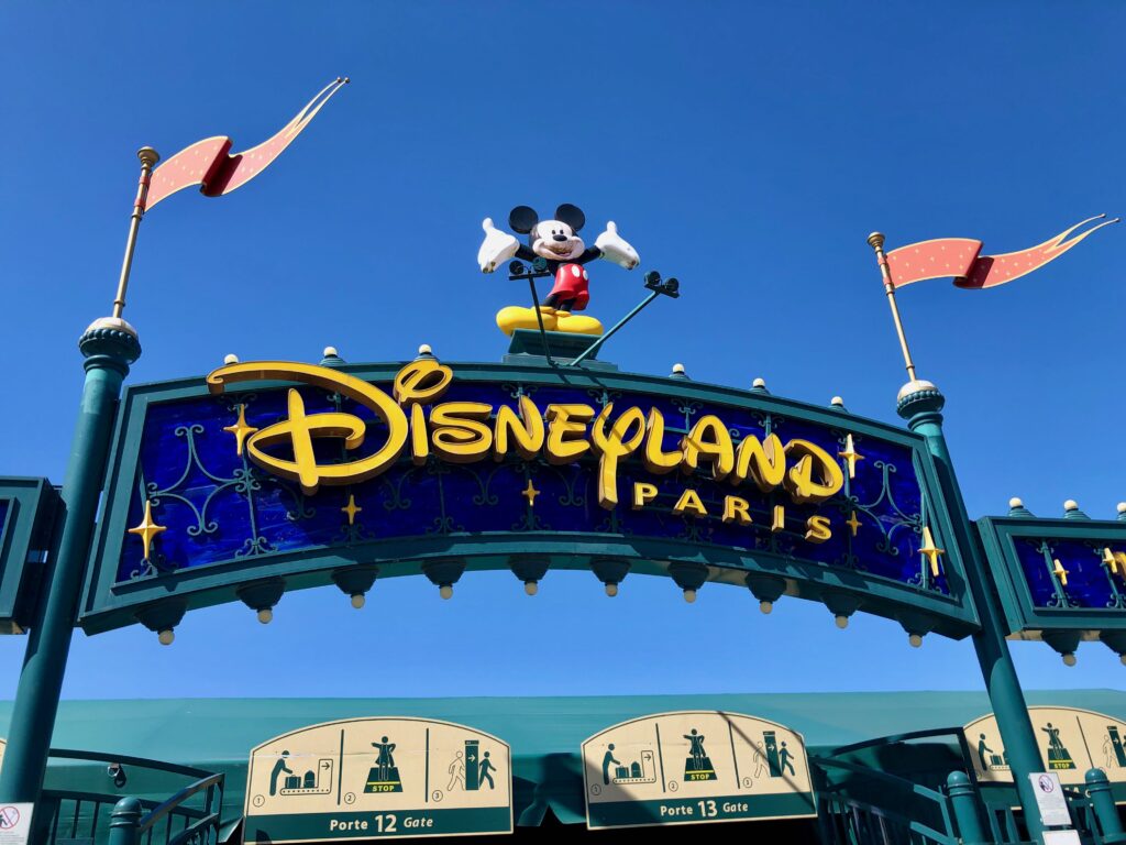 Disneyland Paris entrance sign with Mickey Mouse at the top