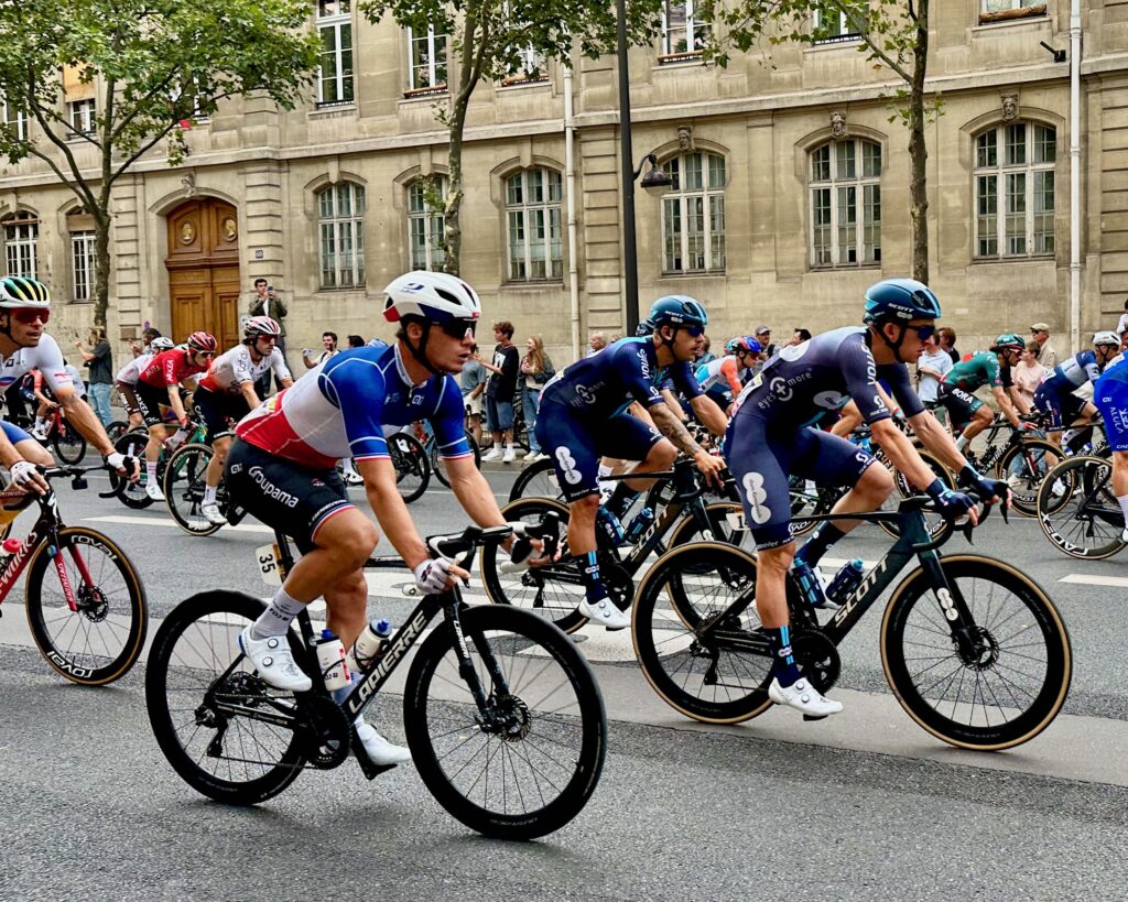 Tour de France bikers racing up the Boulevard Saint-Michel in Paris in the summer of 2023