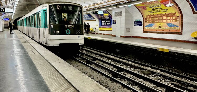 Paris metro train approaching the station