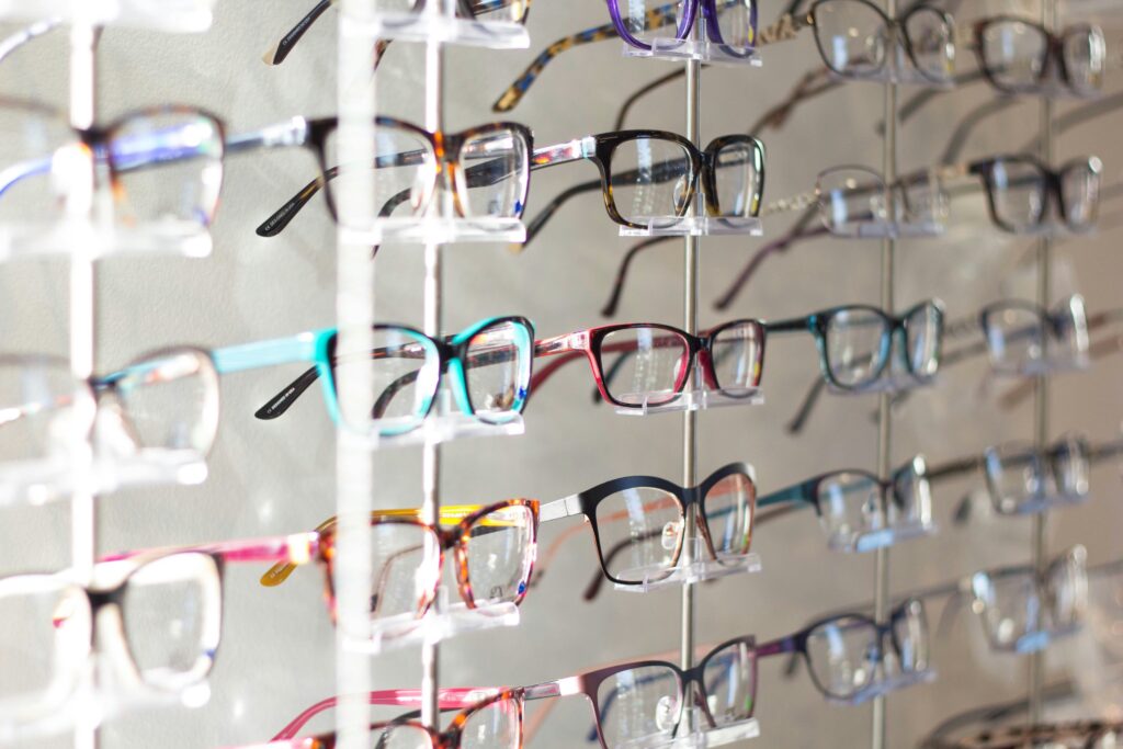 rows of eyeglasses on display